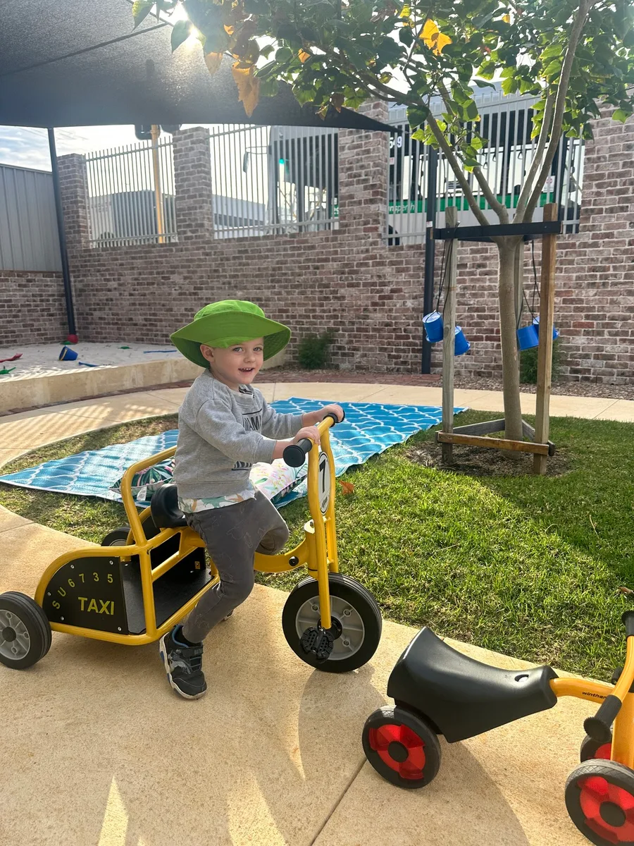 Children in the garden at Sonas Spearwood