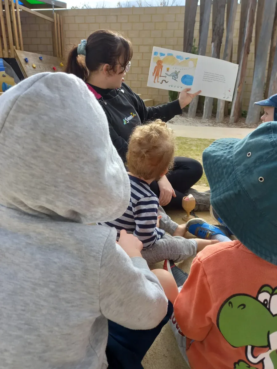 Children at Perth daycare painting Aboriginal dot art during NAIDOC Week celebration